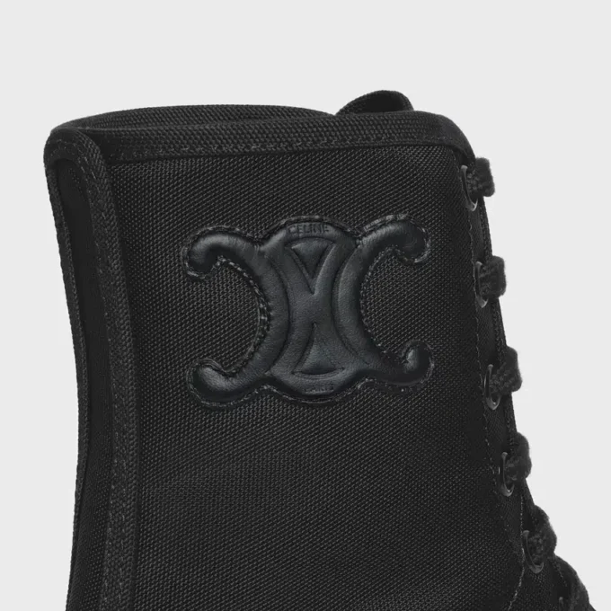 Bota gruesa con cordones de CELINE en nailon y piel de toro brillante Bota gruesa con cordones de CELINE en nailon y piel de toro brillante