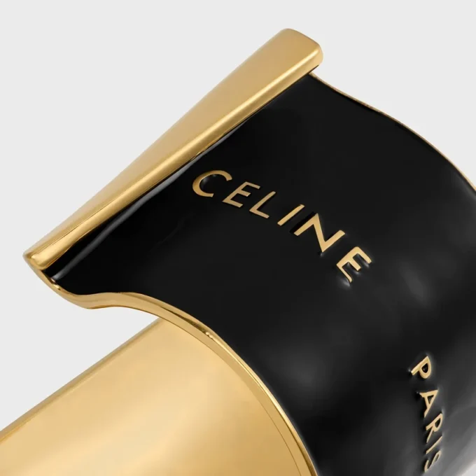Brazalete ancho CELINE Ribbon en esmalte y latón con acabado dorado Brazalete ancho CELINE Ribbon en esmalte y latón con acabado dorado
