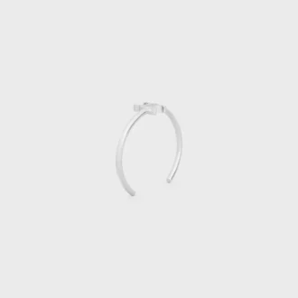 Brazalete asimétrico Triomphe en latón con acabado de rodio
