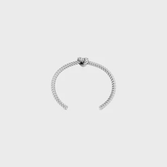 Brazalete con diseño de cordón anudado en latón con acabado de rodio