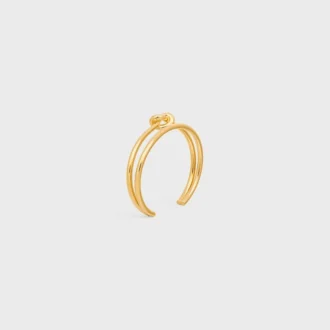 Brazalete doble con nudo en latón con acabado dorado