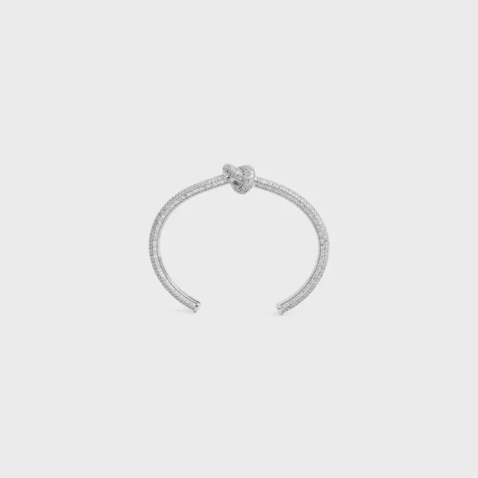 Brazalete Knot Sparkle en strass y latón con acabado de rodio Brazalete Knot Sparkle en strass y latón con acabado de rodio