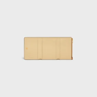 Cartera fina con estampado Triomphe en piel de becerro granulada y flexible