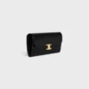 Cartera grande Triomphe en piel de becerro brillante Cartera grande Triomphe en piel de becerro brillante