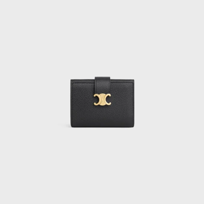 Cartera Nino con correa fina en piel de becerro granulada flexible