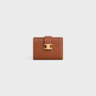 Cartera Nino con correa fina en piel de becerro granulada flexible