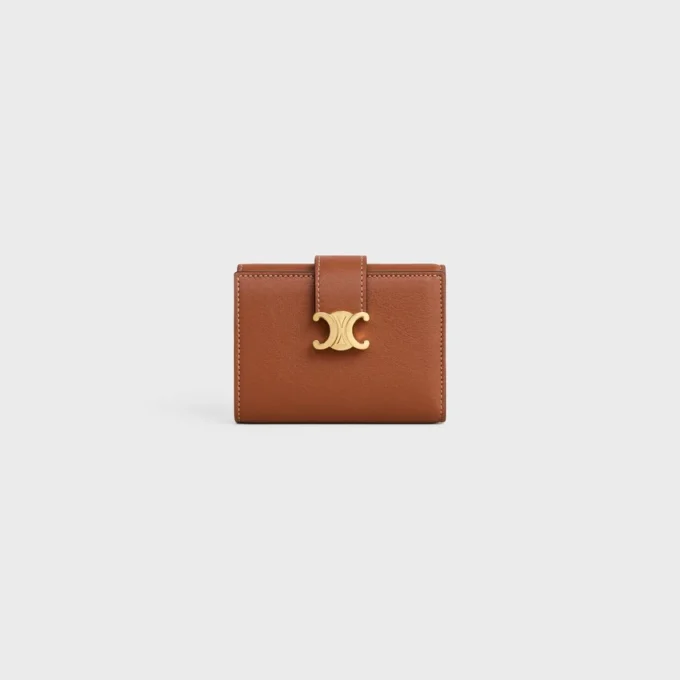 Cartera Nino con correa fina en piel de becerro granulada flexible