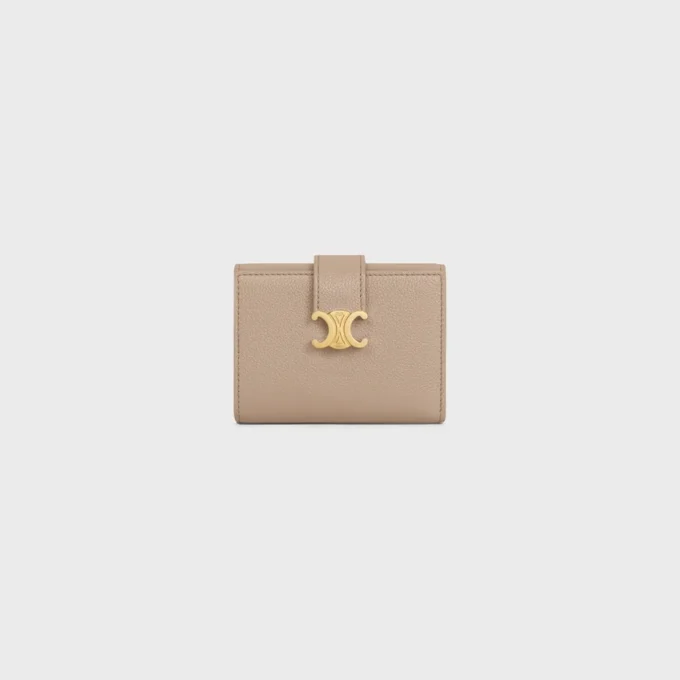 Cartera Nino con correa fina en piel de becerro granulada flexible