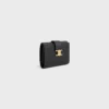 Cartera Nino con correa fina en piel de becerro granulada flexible