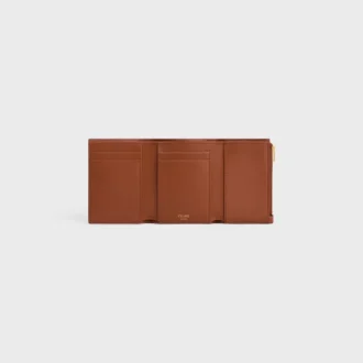 Cartera Nino con correa fina en piel de becerro granulada flexible