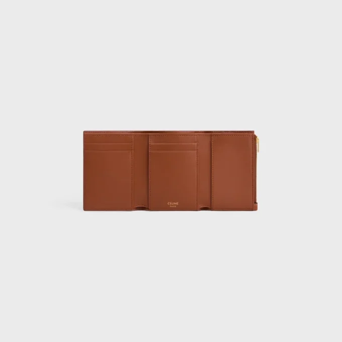 Cartera Nino con correa fina en piel de becerro granulada flexible