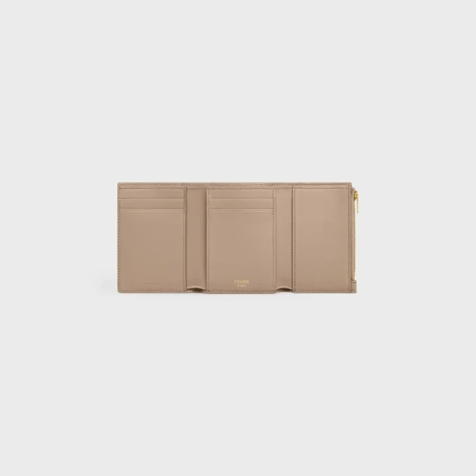 Cartera Nino con correa fina en piel de becerro granulada flexible