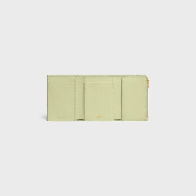 Cartera Nino con correa fina en piel de becerro granulada flexible