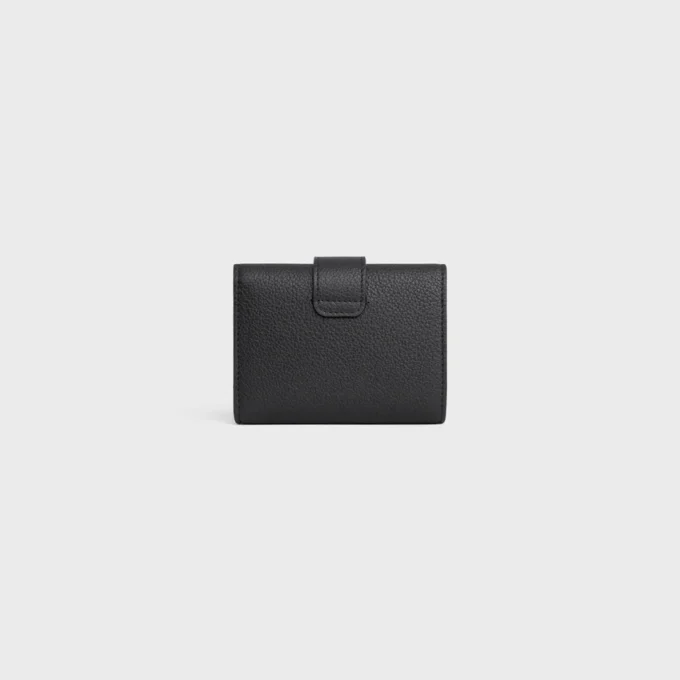Cartera Nino con correa fina en piel de becerro granulada flexible
