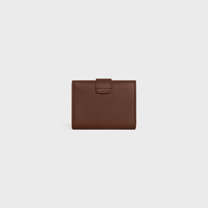 Cartera Nino con correa fina en piel de becerro granulada flexible