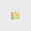 Cartera Nino con correa fina en piel de becerro granulada flexible