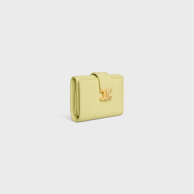 Cartera Nino con correa fina en piel de becerro granulada flexible
