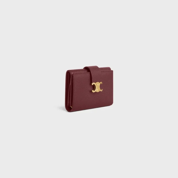 Cartera Nino con correa fina en piel de becerro granulada flexible