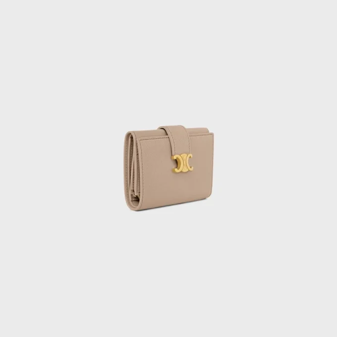 Cartera Nino con correa fina en piel de becerro granulada flexible