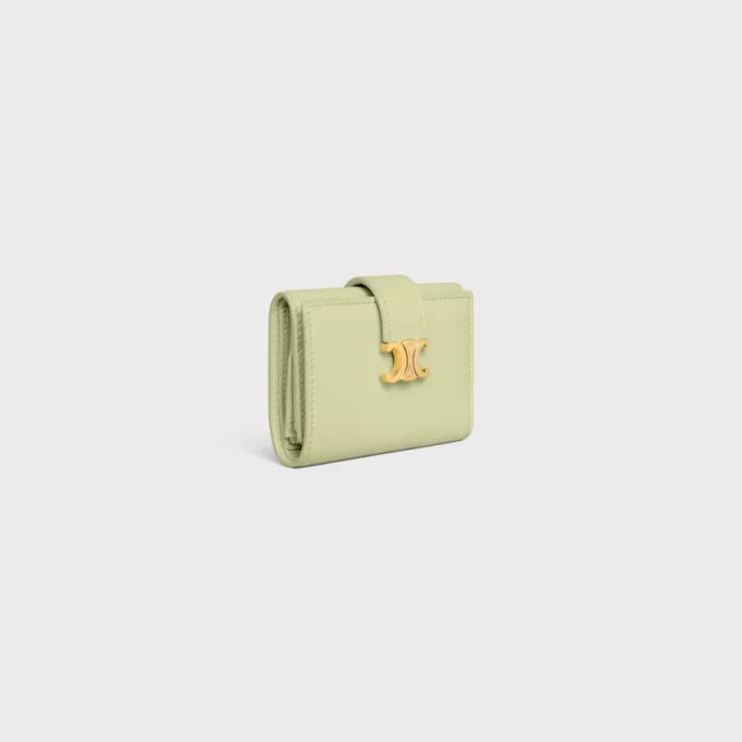 Cartera Nino con correa fina en piel de becerro granulada flexible
