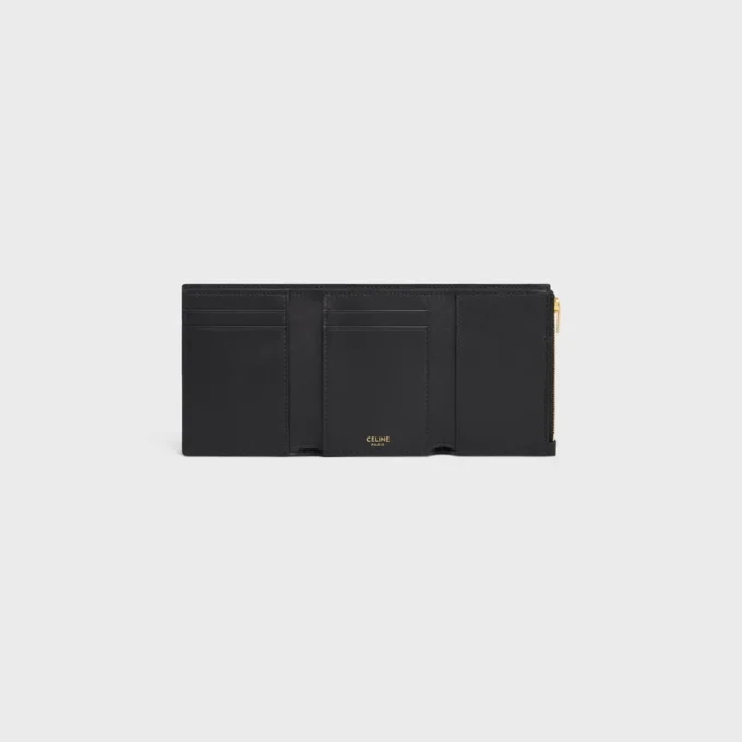 Cartera Nino con correa fina en piel de becerro granulada flexible