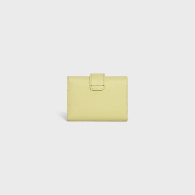 Cartera Nino con correa fina en piel de becerro granulada flexible