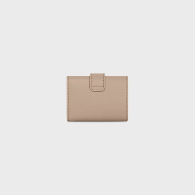 Cartera Nino con correa fina en piel de becerro granulada flexible
