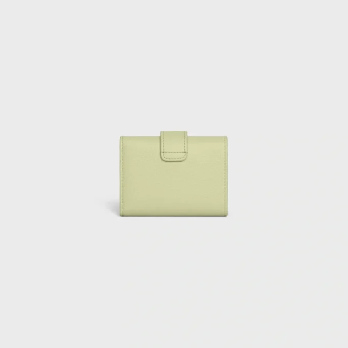 Cartera Nino con correa fina en piel de becerro granulada flexible