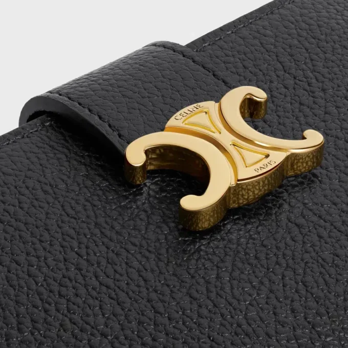 Cartera Nino con correa fina en piel de becerro granulada flexible