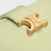 Cartera Nino con correa fina en piel de becerro granulada flexible