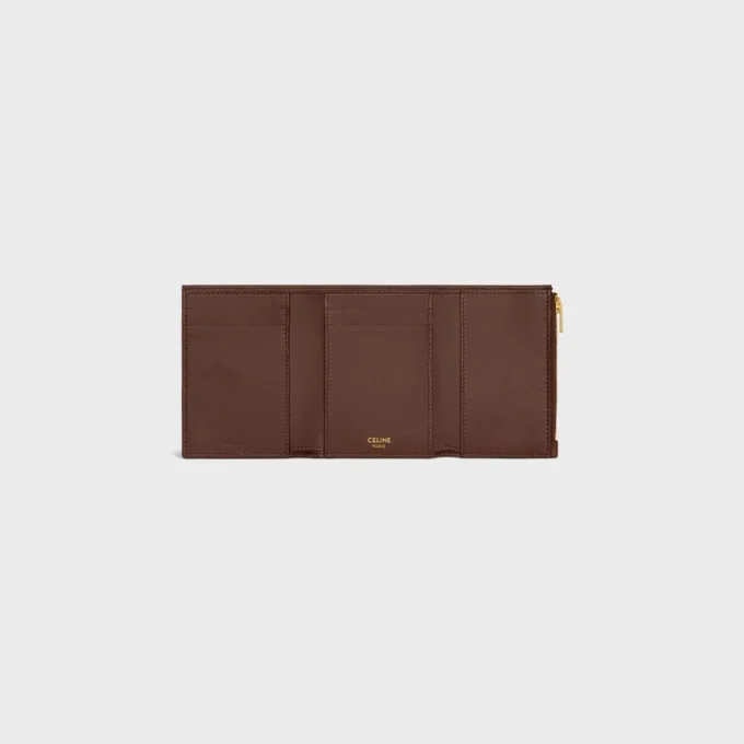 Cartera Nino con correa fina en piel de becerro granulada flexible