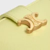 Cartera Nino con correa fina en piel de becerro granulada flexible
