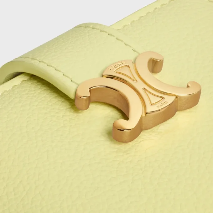 Cartera Nino con correa fina en piel de becerro granulada flexible