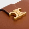 Cartera Nino con correa fina en piel de becerro granulada flexible