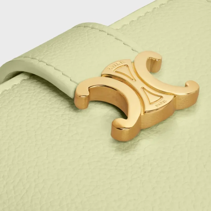 Cartera Nino con correa fina en piel de becerro granulada flexible