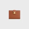 Cartera Nino de correa mediana en piel de becerro granulada flexible Cartera Nino de correa mediana en piel de becerro granulada flexible