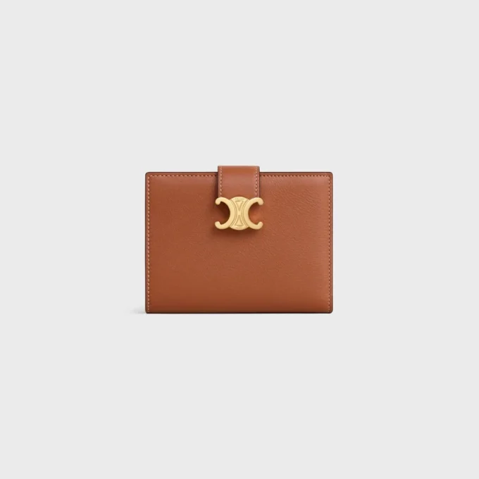 Cartera Nino de correa mediana en piel de becerro granulada flexible Cartera Nino de correa mediana en piel de becerro granulada flexible