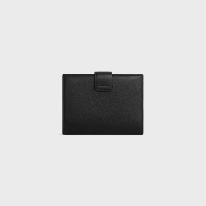 Cartera Nino de correa mediana en piel de becerro granulada flexible Cartera Nino de correa mediana en piel de becerro granulada flexible