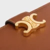 Cartera Nino de correa mediana en piel de becerro granulada flexible Cartera Nino de correa mediana en piel de becerro granulada flexible