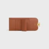 Cartera pequeña con solapa Triomphe Canvas Cartera pequeña con solapa Triomphe Canvas