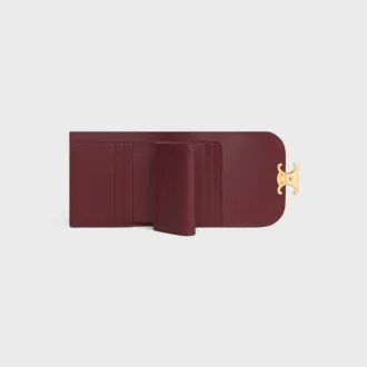 Cartera pequeña con solapa Triomphe en piel de becerro charol