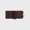 Cartera pequeña con solapa Triomphe en pitón Cartera pequeña con solapa Triomphe en pitón