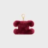 Charm Triomphe con pompón en piel de oveja bordada y piel de becerro Charm Triomphe con pompón en piel de oveja bordada y piel de becerro