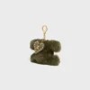 Charm Triomphe con pompón en piel de oveja y piel de becerro Charm Triomphe con pompón en piel de oveja y piel de becerro