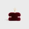 Charm Triomphe con pompón en piel de oveja y piel de becerro Charm Triomphe con pompón en piel de oveja y piel de becerro