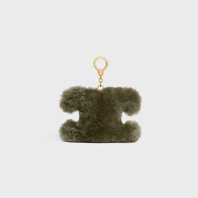 Charm Triomphe con pompón en piel de oveja y piel de becerro Charm Triomphe con pompón en piel de oveja y piel de becerro