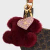 Charm Triomphe con pompón en piel de oveja y piel de becerro Charm Triomphe con pompón en piel de oveja y piel de becerro