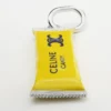 Charms Barra de caramelo en esmalte y latón con acabado de rodio