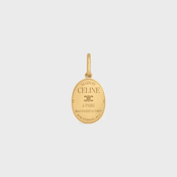 Charms CELINE Medalla de latón con acabado dorado Charms CELINE Medalla de latón con acabado dorado
