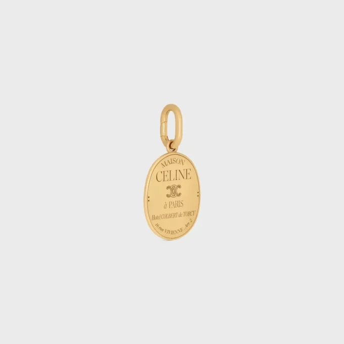 Charms CELINE Medalla de latón con acabado dorado Charms CELINE Medalla de latón con acabado dorado